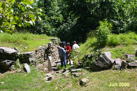 The CNBC crew is taking more pictures of the Nature Conservancy crew at work.