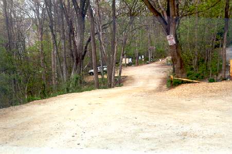 Walk to the very end of the parking area.