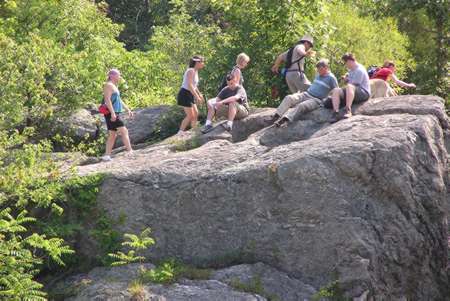 Hikers are shown on the Billy Goat Trail. The picture was taken from the Virginia side of the river.