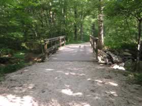The trail crosses a bridge over Mine Run.  This stream furnishes water to the canal when the river level is low. 