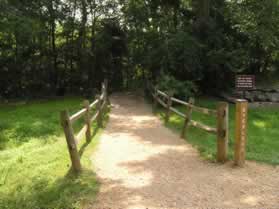 The trail crosses the old canal remains.