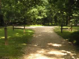 The trail intersects with the Old Carraige Road.  Turn slightly to the right on that road.