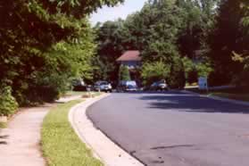 Walk on the sidewalk down the hill (west) along Lake Newport Rd from Stuart Rd Park.