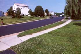 The path intersects with Kingsvale Cir.  Turn right and follow the sidewalk until Kingstream Dr.