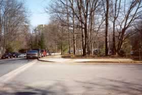 The trail crosses the driveways into Hunters Woods School.