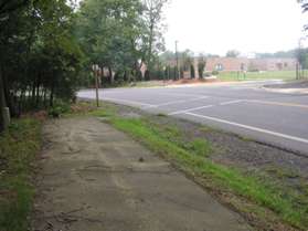 After following Steeplechase Rd. for a short distance the trail crosses to the other side next to the school driveway.