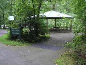 The trail passes a picnic pavilion on the right.
