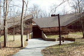 After a short walk the trail passes the visitors center.  The trail turns right at the visitors center.