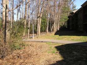 The trail jogs slightly to the right at the next trail intersection.  Keep to the left towards the covered bridge.