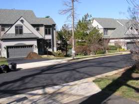 The trail intersects with Waterfront Rd.  Cross the street and follow the sidewalk on the other side to the right.