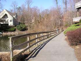 The trail passes next to the lake for a short distance.