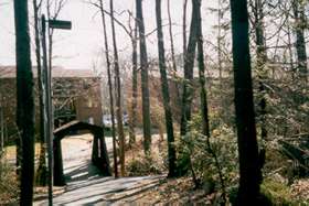 Follow the trail to the covered bridge and cross the bridge.