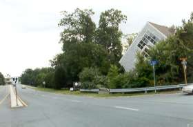 Cross Ridge Heights Rd and take the dirt path between South Lakes Dr and the guard rail.