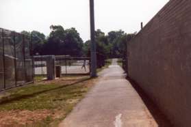The trail cuts straight through the back of the high school.