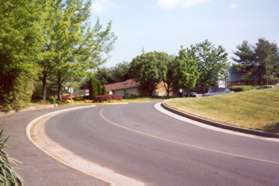 The trail turns left just prior to the first road and enters the South Lakes Village Center.