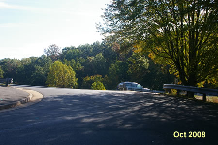 Take the trail to the right upon exiting from the pool parking lot.