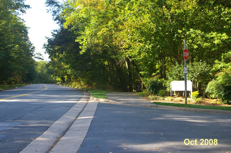 The trail goes into the woods for a short distance after crossing Glade Ct.