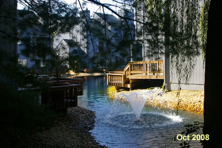 Notice the pond between the homes here.