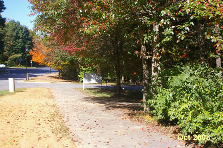 Turn left and follow the asphalt trail on Ridge Heights Rd. for a short distance.