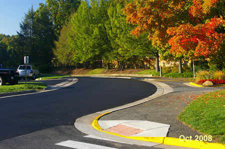 Follow the asphalt trail across several access roads towards South Lakes Dr.