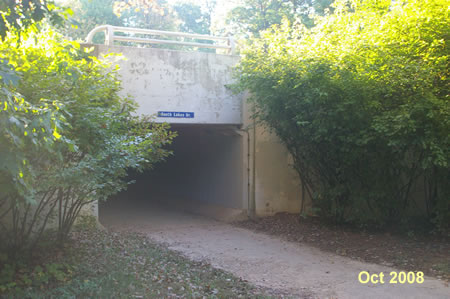 The trail passes through a tunnel under South Lakes Dr.