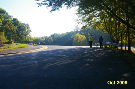 Turn left onto the asphalt trail along Twin Branches Rd. after leaving the pool parking area.