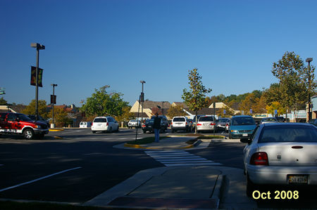 The tunnel ends at the South Lakes Shopping Center where the walk started.