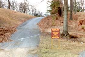 After crossing the dam the trail climbs a hill.