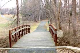 The path crosses a bridge.