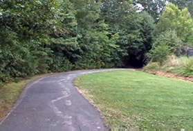 Turn right onto the intersecting asphalt trail.