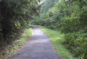 Turn left onto the intersecting asphalt trail.