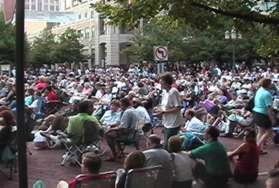 The crowd at Fountain Square is attending one of the free concerts that are held on Saturdays in the summer.