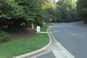 Turn left at North Shore Drive and walk along the grass to the next road.