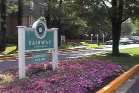 After crossing Wainright Dr turn right to cross North Shore Dr. Follow the sidewalk into the Fairway Apartments area.