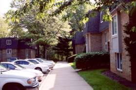 Turn right upon reaching the parking area and follow the sidewalk to the asphalt path leading to Fairway Dr.