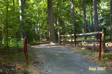 The trail crosses Foxcroft Rd.  Look to the right for the trail appearance on the other side of that road.