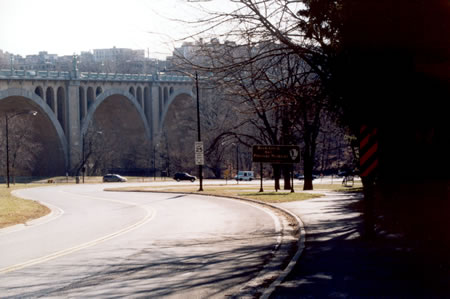 The Taft Bridge in the distance carries Connecticut Av across the park.  The Metro Red Line goes under the park next to the bridge.
