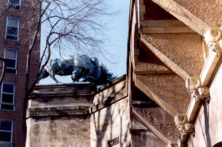 Look up to your right after passing under the bridge to see one of the buffalo statues.