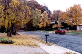 At the end of Richelieu Dr turn left to follow the sidewalk along Malraux Dr.