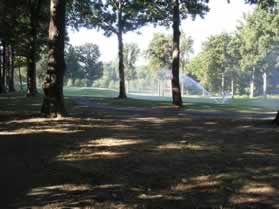 The trail follows the edge of the golf course.