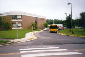 The trail reaches Lake Newport Rd.  Cross at the crosswalk to the school side.