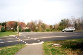 Take the crosswalk across Bennington Woods Rd.  Turn right and cross Walnut Branch Rd.  Follow trail along Walnut Branch Rd.