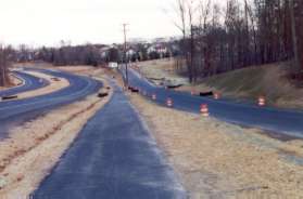 The road to the right was built to connect the former Cheviot Dr to Wiehle Av.  Cheviot Dr. was split into 2 separate parts by the Parkway.