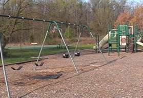 In addition to the play equipment there is a basketball court.