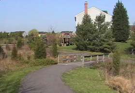 After crossing the bridge take the intersecting trail to the left.