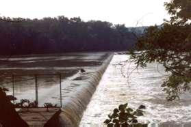 The aqueduct dam is next to the rocky section of trail.