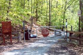 Turn right and enter the service road into Riverbend Park.