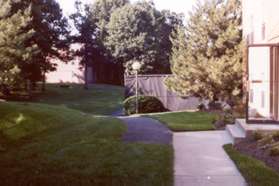 At the end of the sidewalk take the asphalt trail next to the tennis courts.