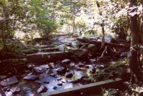 There used to be a bridge at this point but it was washed out. It is now a rock crossing.