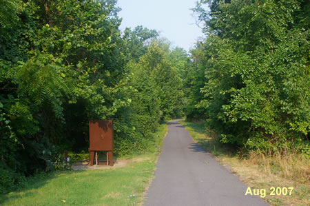 Take the asphalt trail west from Walnut Branch Road at the intersection with Purple Sage Ct.
